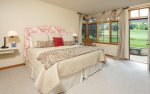 Master Suite with King Bed, Walk-In Closet, En-Suite Bath with Jacuzzi Tub and Steam Shower.